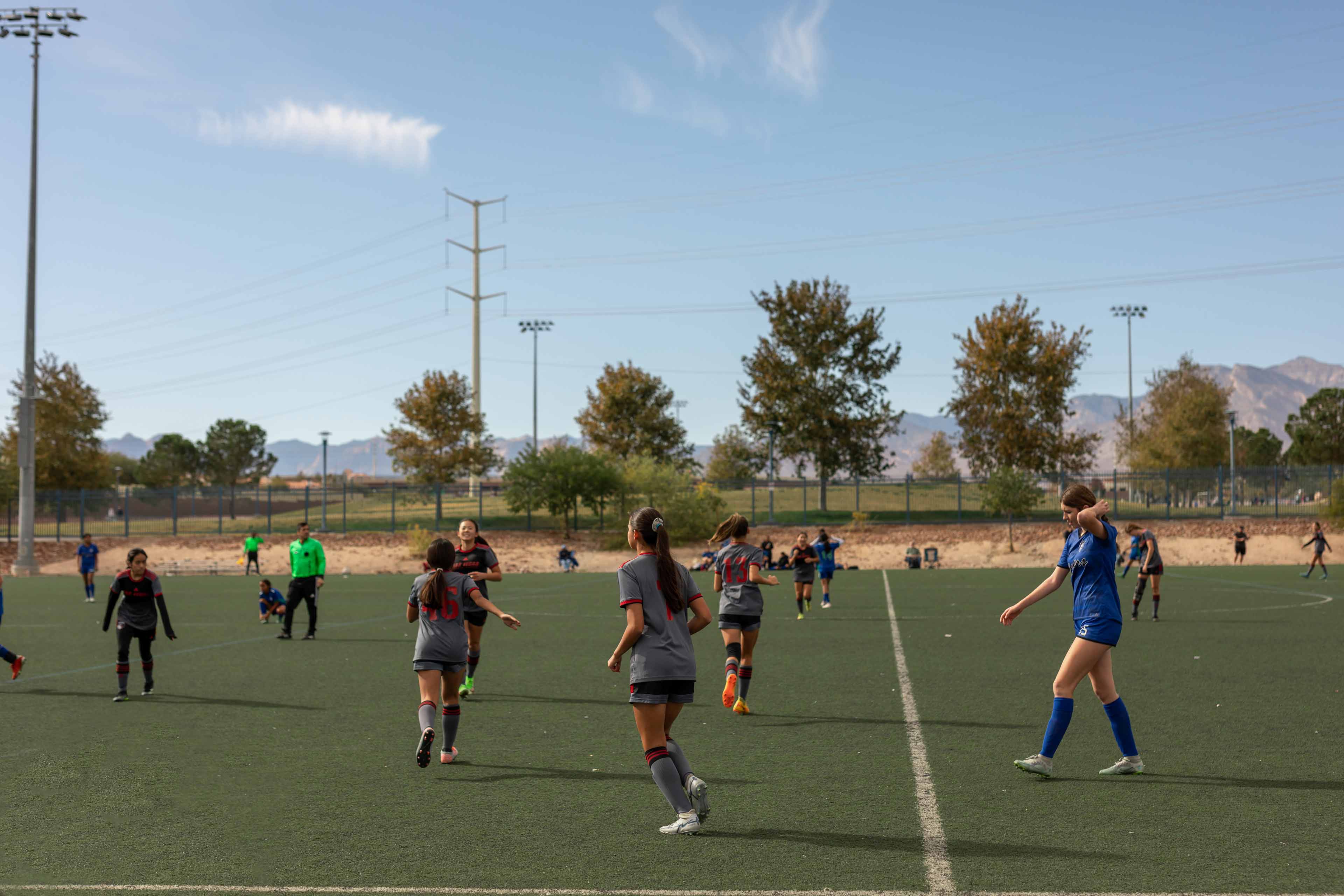 girls soccer game players