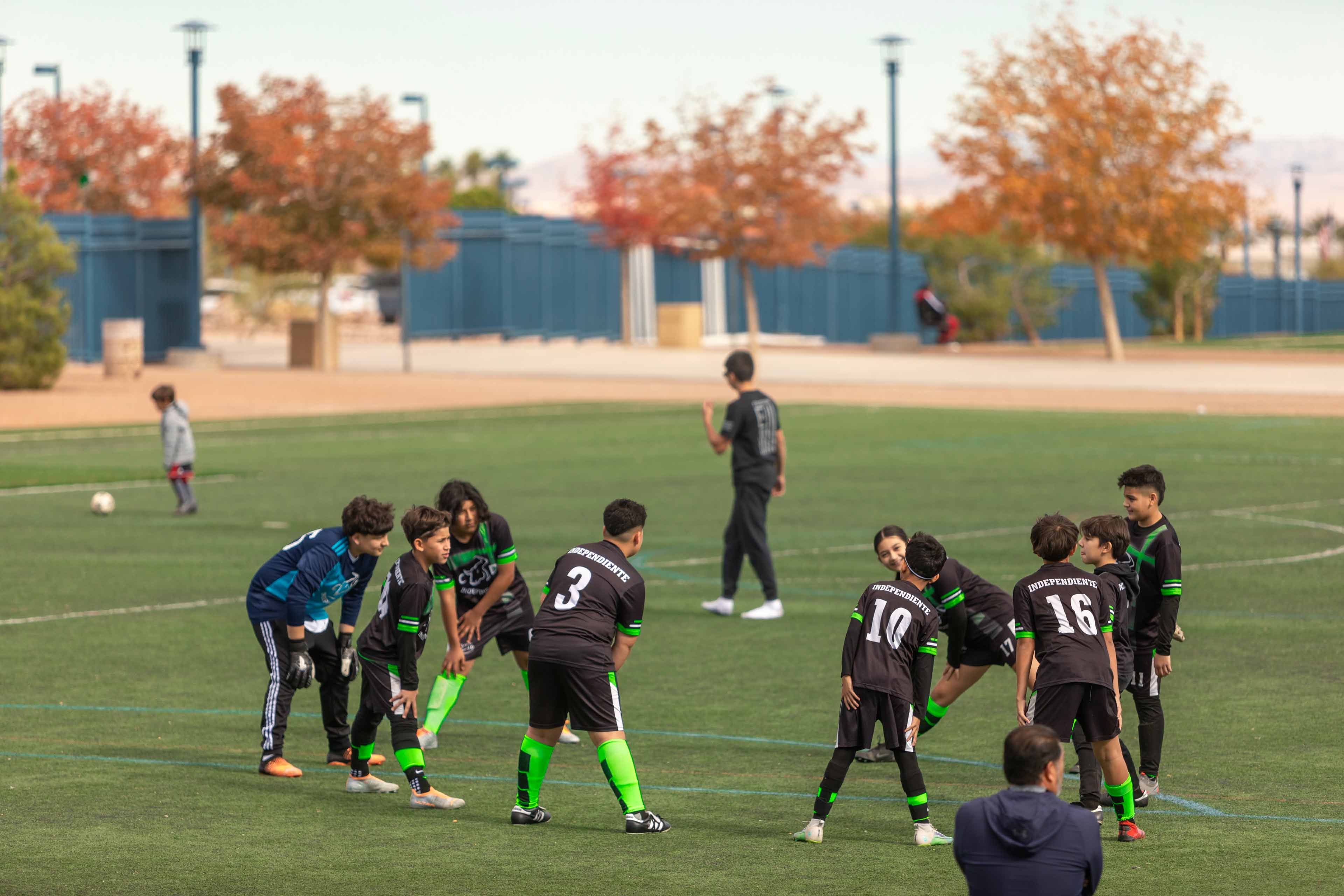 youth soccer team stretching before a game