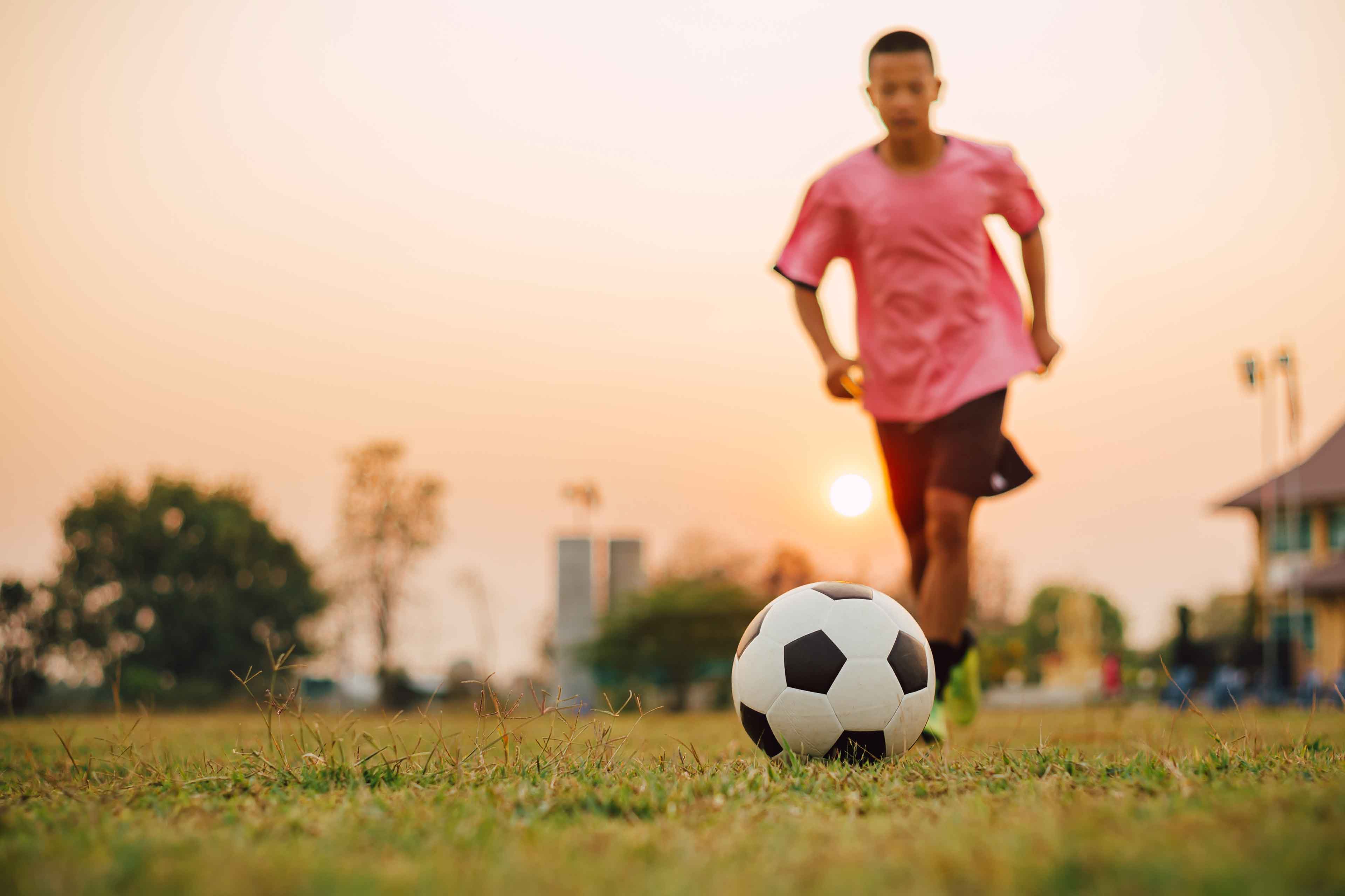 action sport outdoors kids playing soccer football