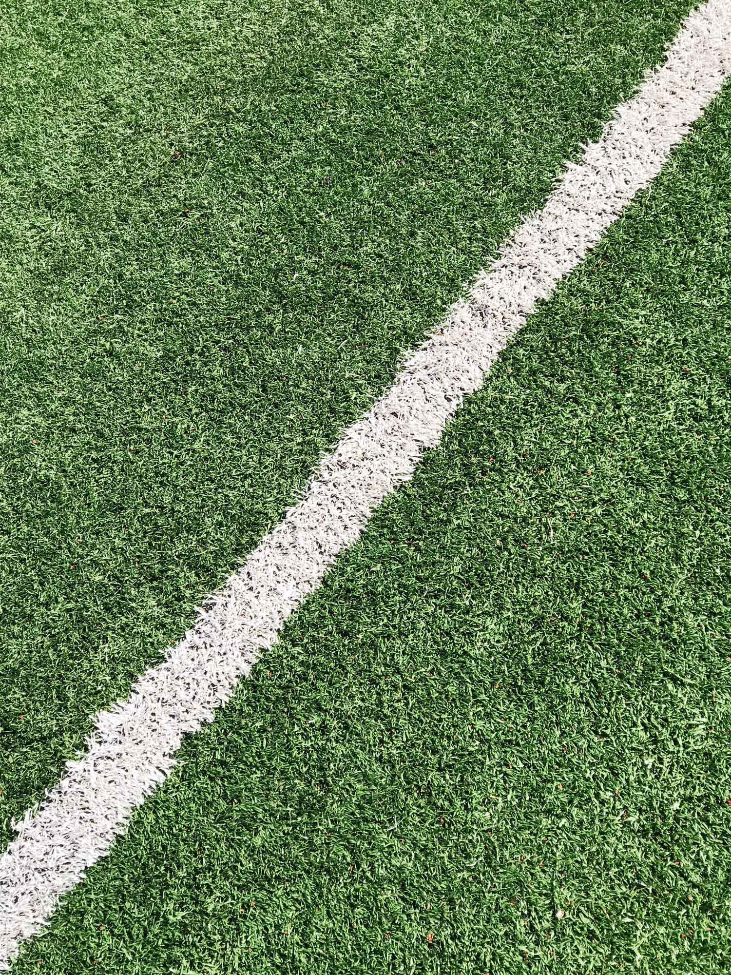 close up of soccer field grass side line