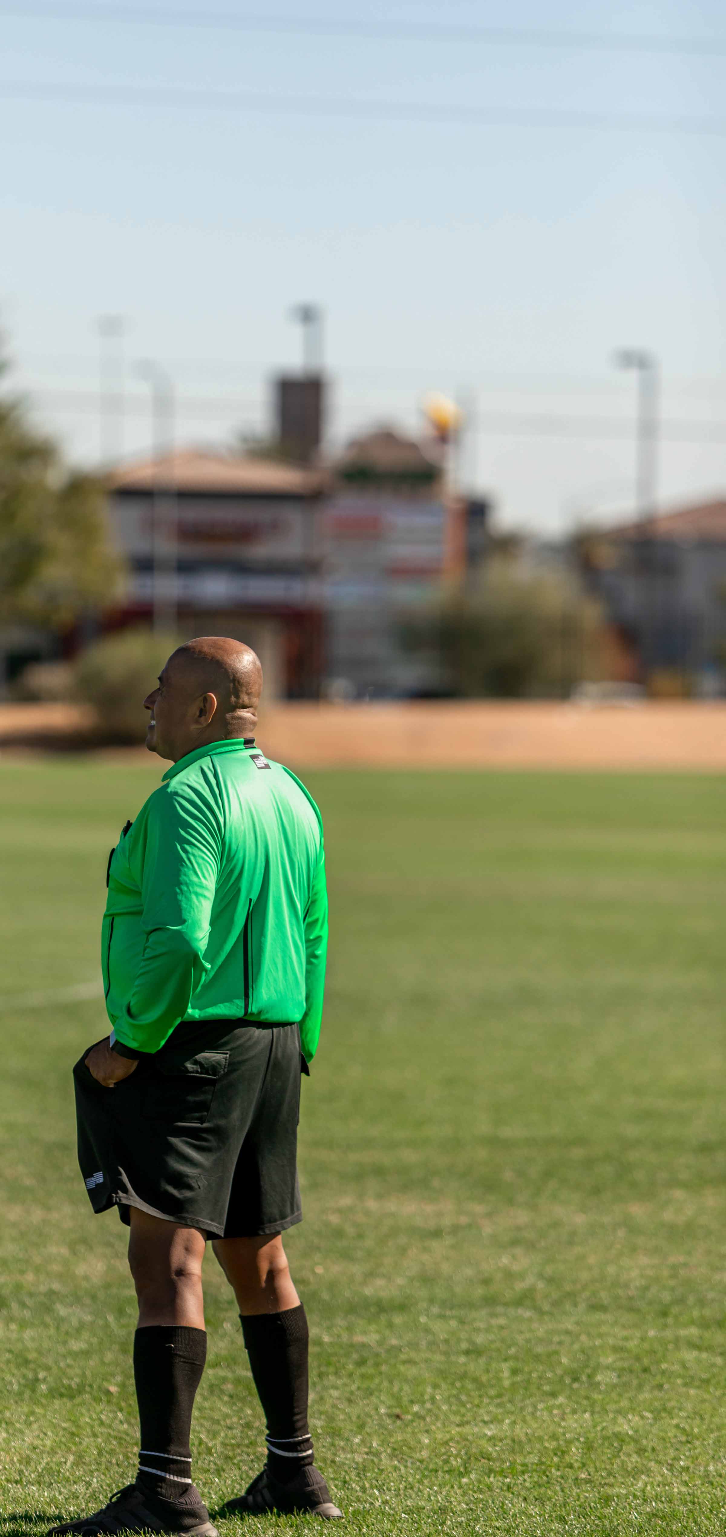 referee stainding on a soccer field